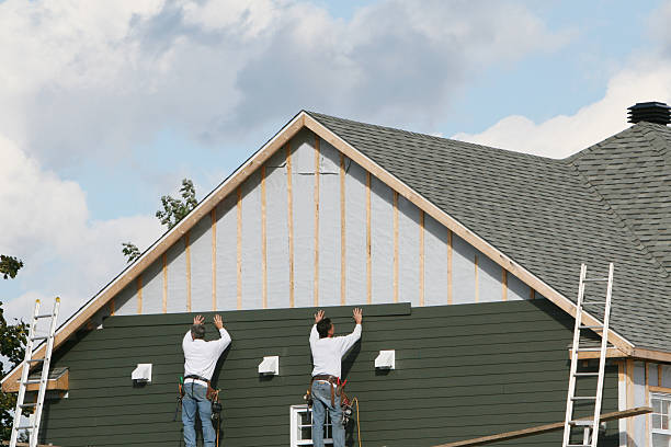 Professional Siding technician working in Williamsfield, OH